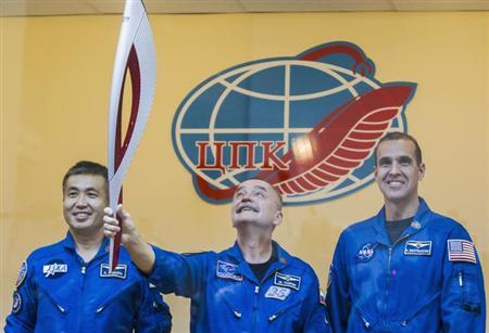 Russian cosmonauts will take the Olympic Torch for space walk